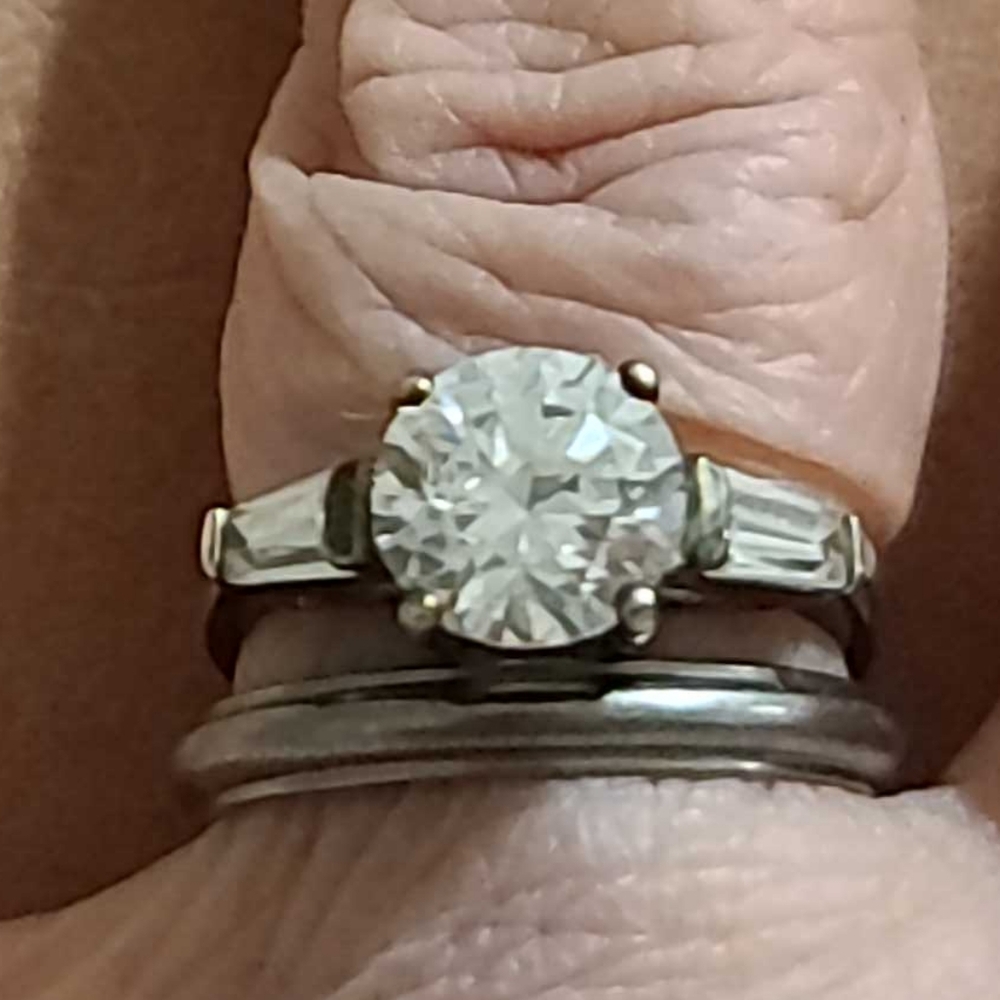 CZ solitaire with shoulder gems. Platinum over sterling.